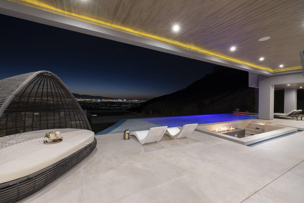 Rooftop deck features a spa with a fire feature. (Douglas Elliman)