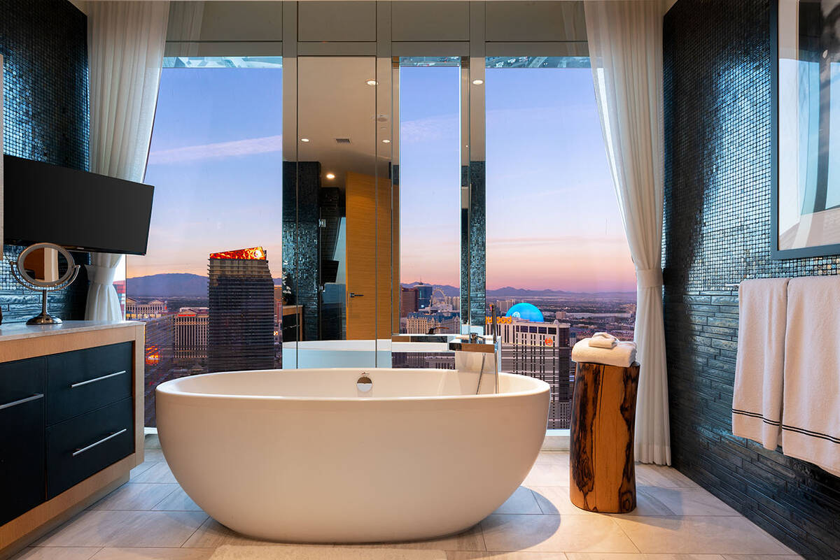 The 3,980-square-foot Waldorf corner penthouse on the 41st floor features a spa-like master bat ...