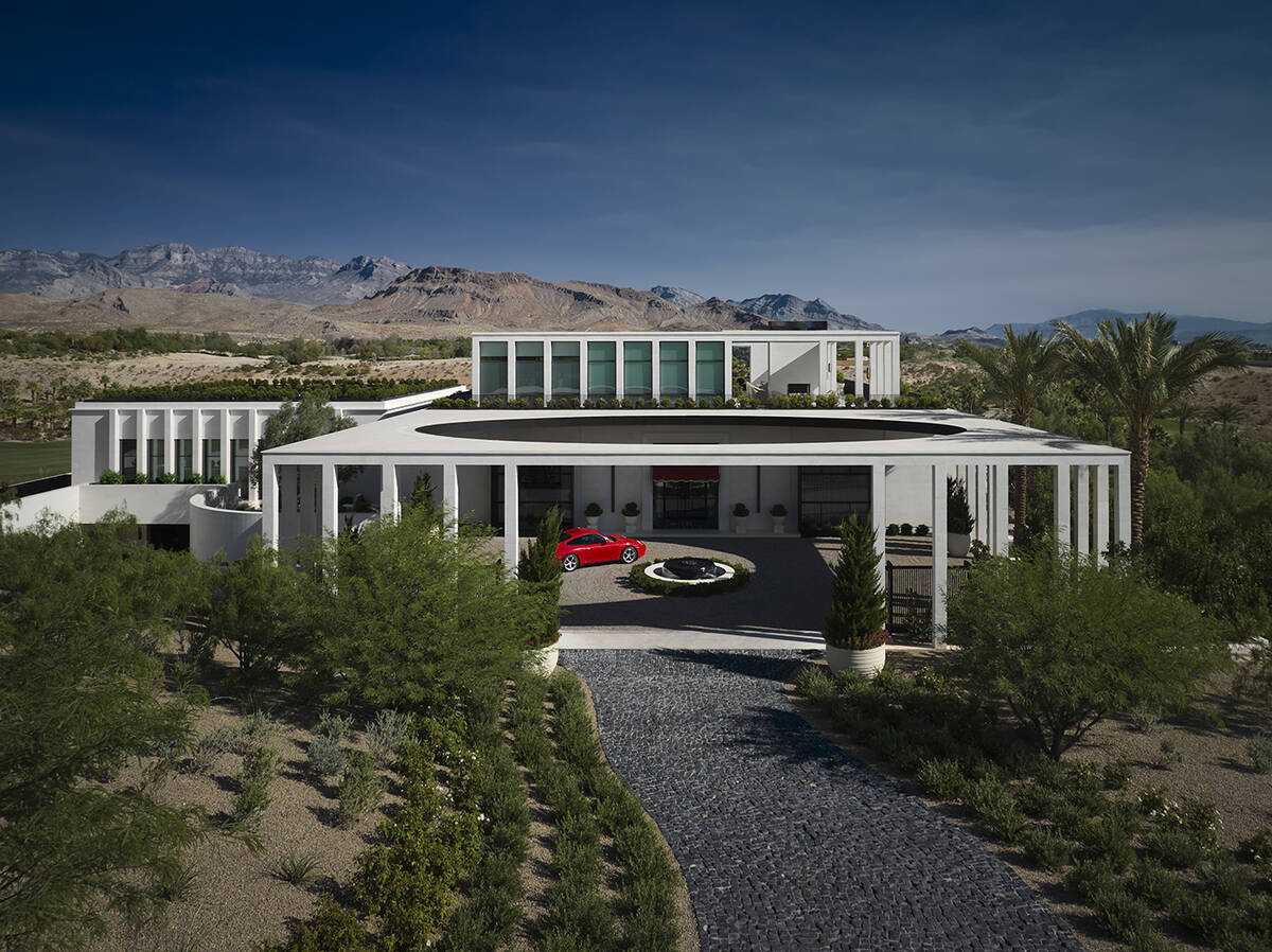 Architect Daniel Joseph Chenin designed this 12,400-square-foot three-level estate in the exclu ...