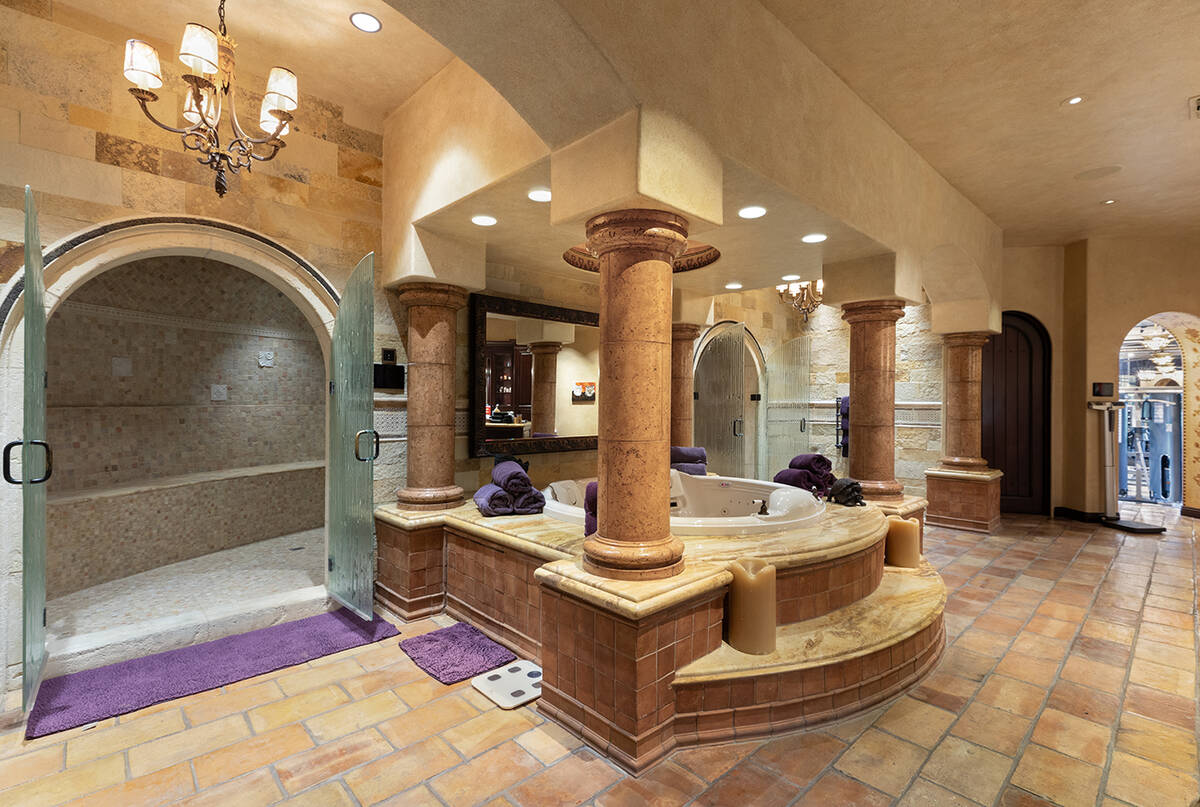 The home has 14 baths, including this master bath. (BHHS)