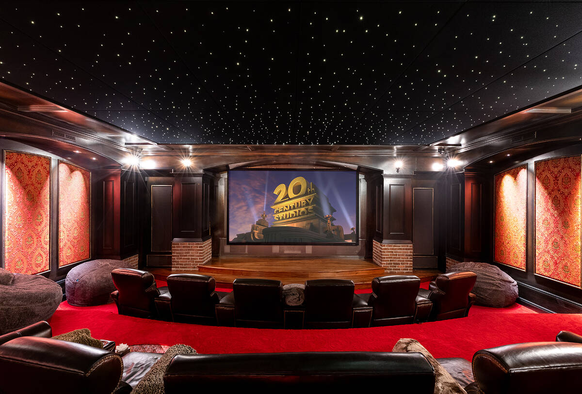 The home theater has ample seating. (BHHS)