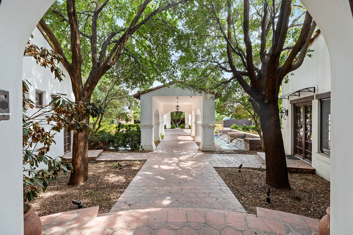 The south valley home has mature landscaping. (BHHS)
