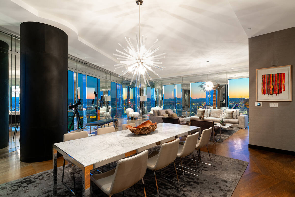 The $8.8 million Waldorf Astoria penthouse has views from most rooms, including the formal dini ...