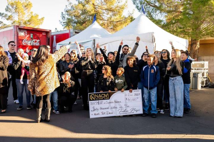 Naqvi Injury Law donated $40,000 to the 98.5 KLUC Chet Buchanan Toy Drive. (Naqvi Injury Law)
