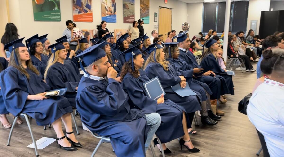 Graduates of University of Nevada, Reno Extension’s Biz 101 course celebrate at a graduation ...